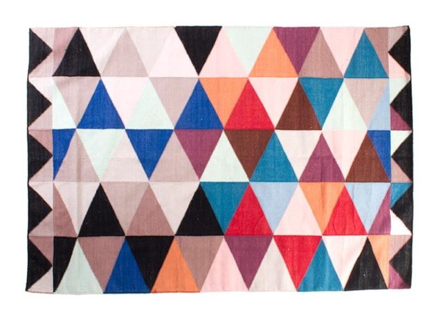 Colorful-woven-rug-with-geo-triangles