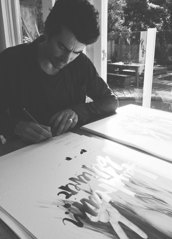 Nathan signing the limited edition prints