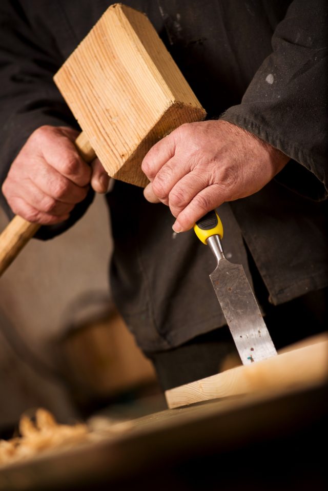 http://www.dreamstime.com/stock-image-carpenter-joiner-using-chisel-mallet-close-up-hands-wooden-to-cut-shape-piece-wood-woodworking-image40310961