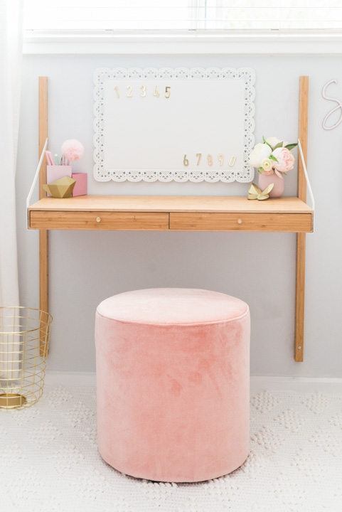 Desk with velvet ottoman