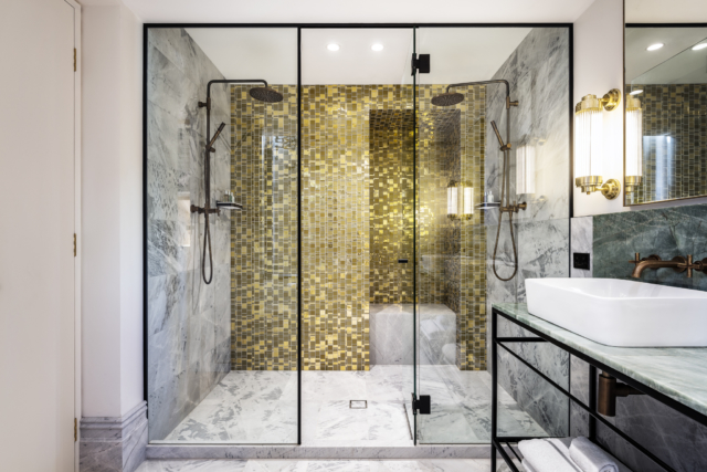 These unexpected gold tiles in the bathroom evoke a Gustav Klimt painting.