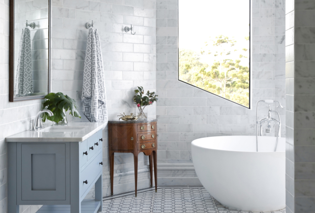 Modern bathroom accessorised with antiques