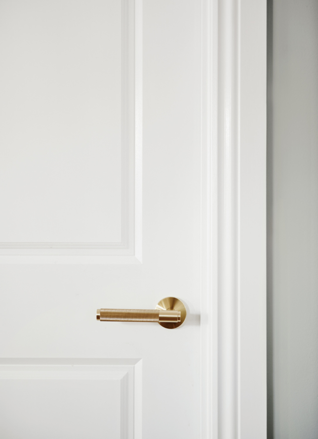 Brass handles complement light fittings and tap ware