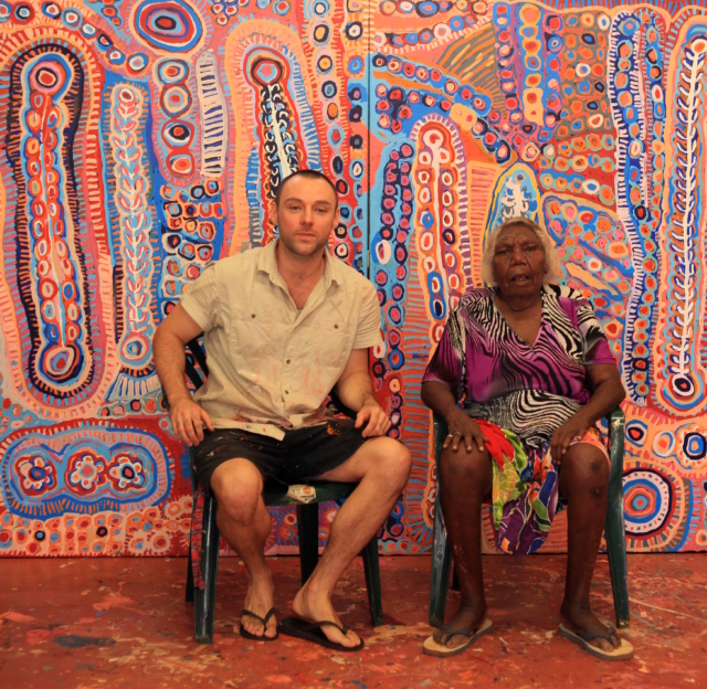 Guy with Murdie Morris and one of her works