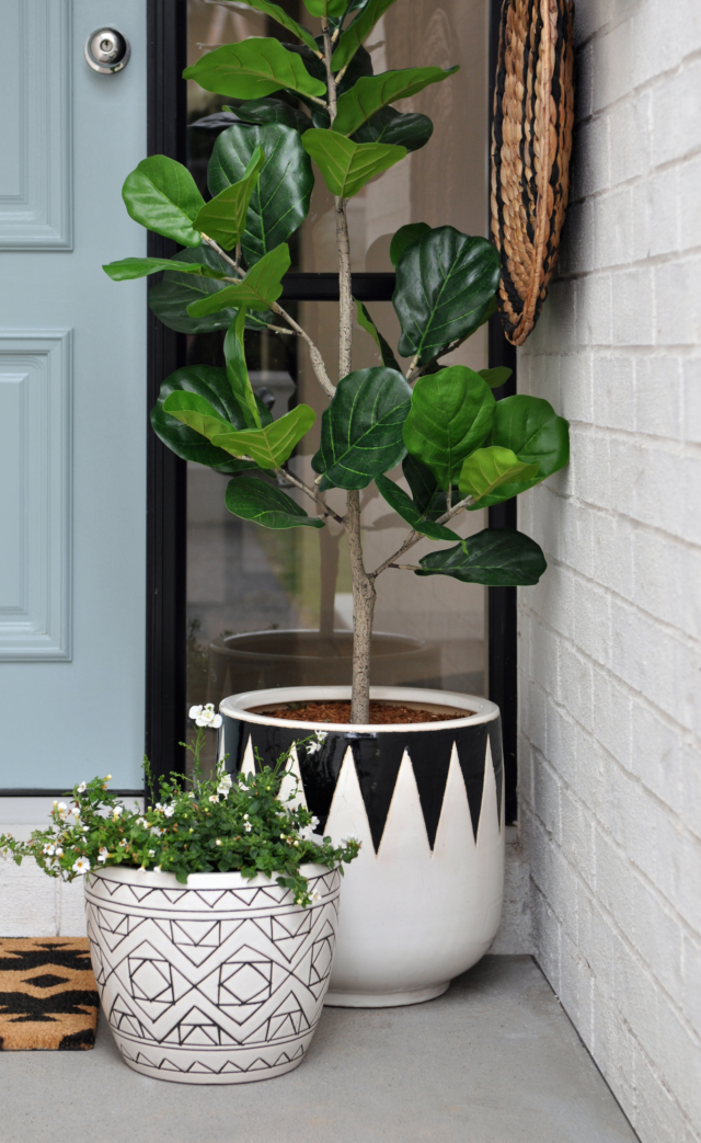 AFTER faux plants and stylish pots now accessorise the front door