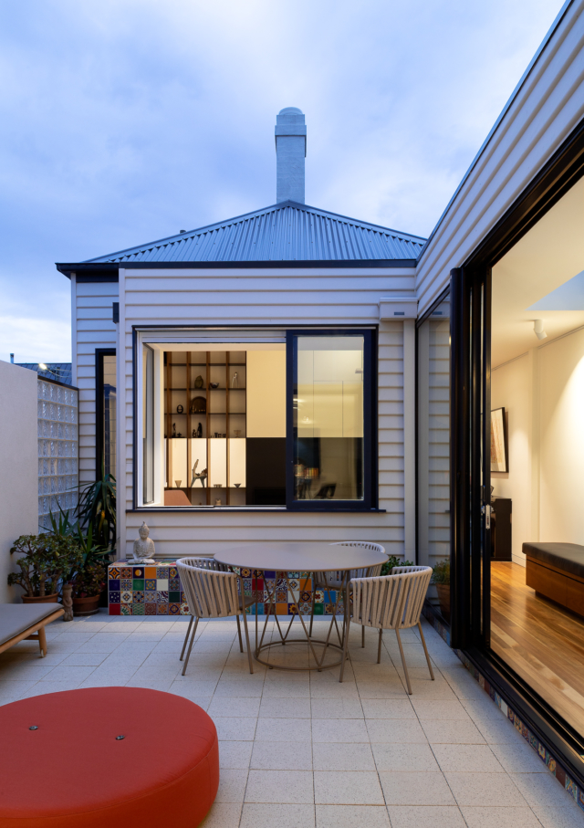 A central courtyard connects the old and new part of the home