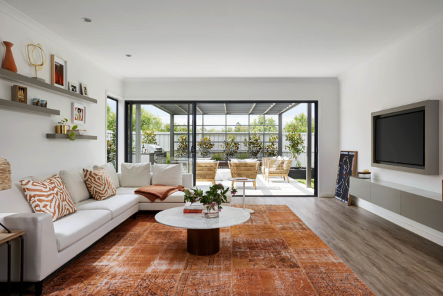 A burnt orange rug features in Henley's 'Marlo' display home