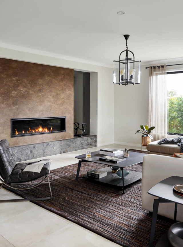 A rug helps to anchor the lounge room at Henley's Sahara display home