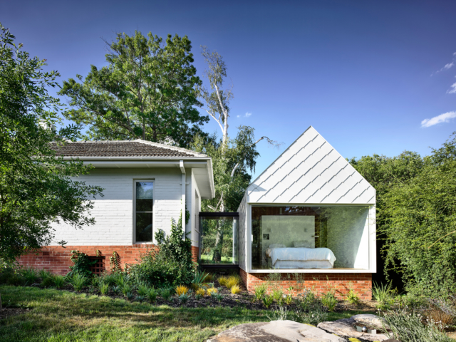 The existing cottage is connected to the master bedroom pavilion via a glass hallway