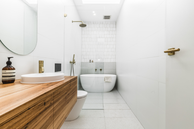 TileCloud's Avalon Gloss square and subway pattern tiles make a fabulous feature wall in the bathroom