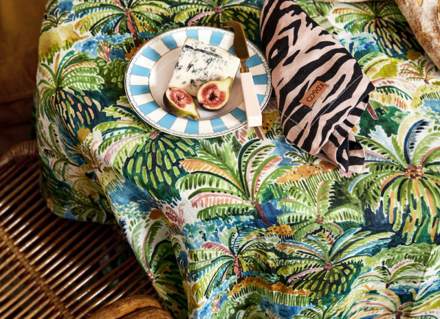 Seen here is a 'Colombo' print table cloth with 'Zebra' print napkin