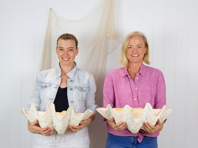 Amanda and Sally with a pair of giant clam shells