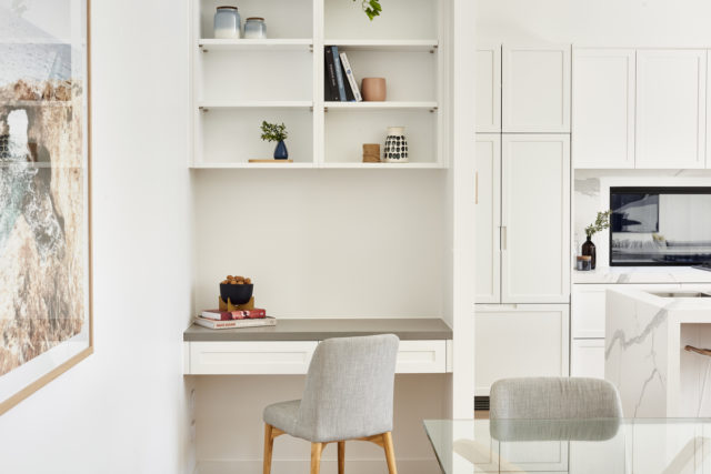 A study nook makes efficient use of space beside the kitchen