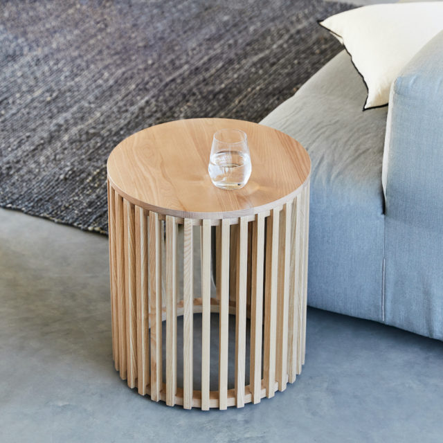 We love this slatted timber side table