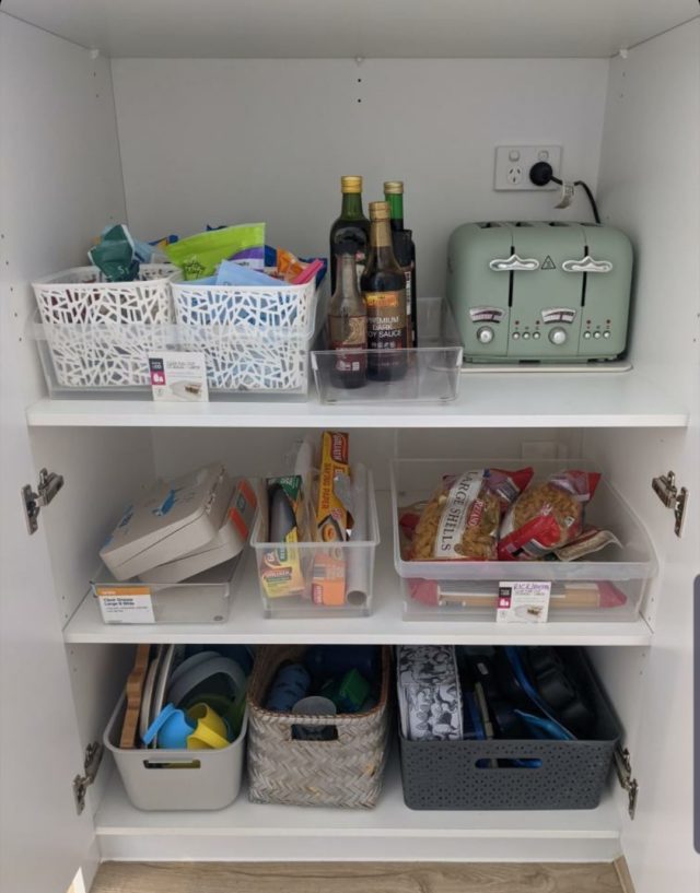 Pull out pantry drawers are an organized, presentable way to store items on  the shelves of your pantry.