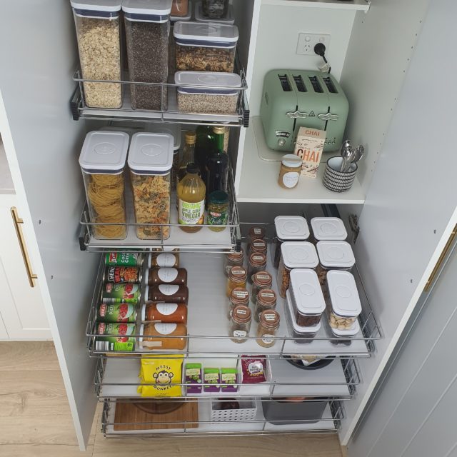 Pull out pantry drawers are an organized, presentable way to store