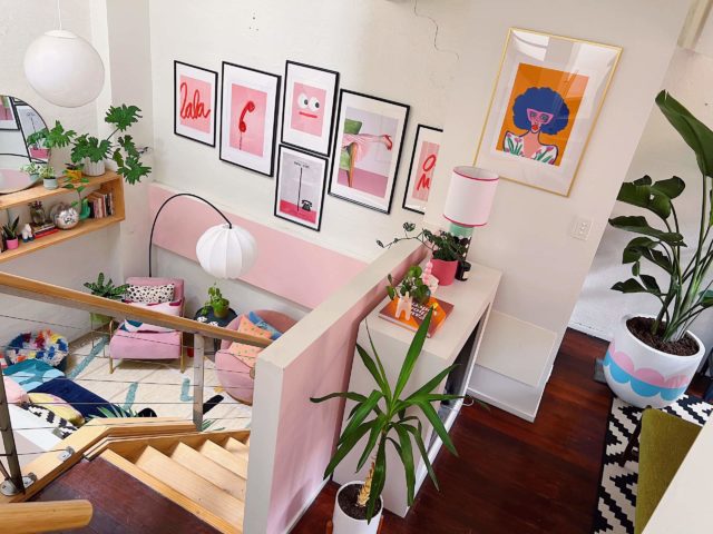 Candace has personalised the apartment with pops of pink paint