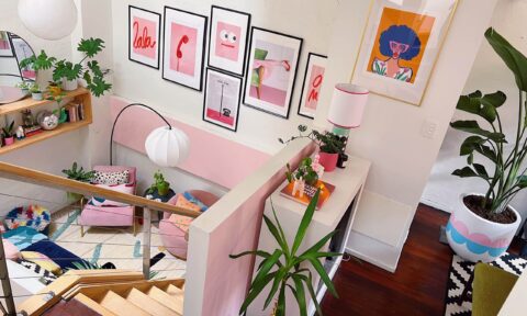Candace has personalised the apartment with pops of pink paint