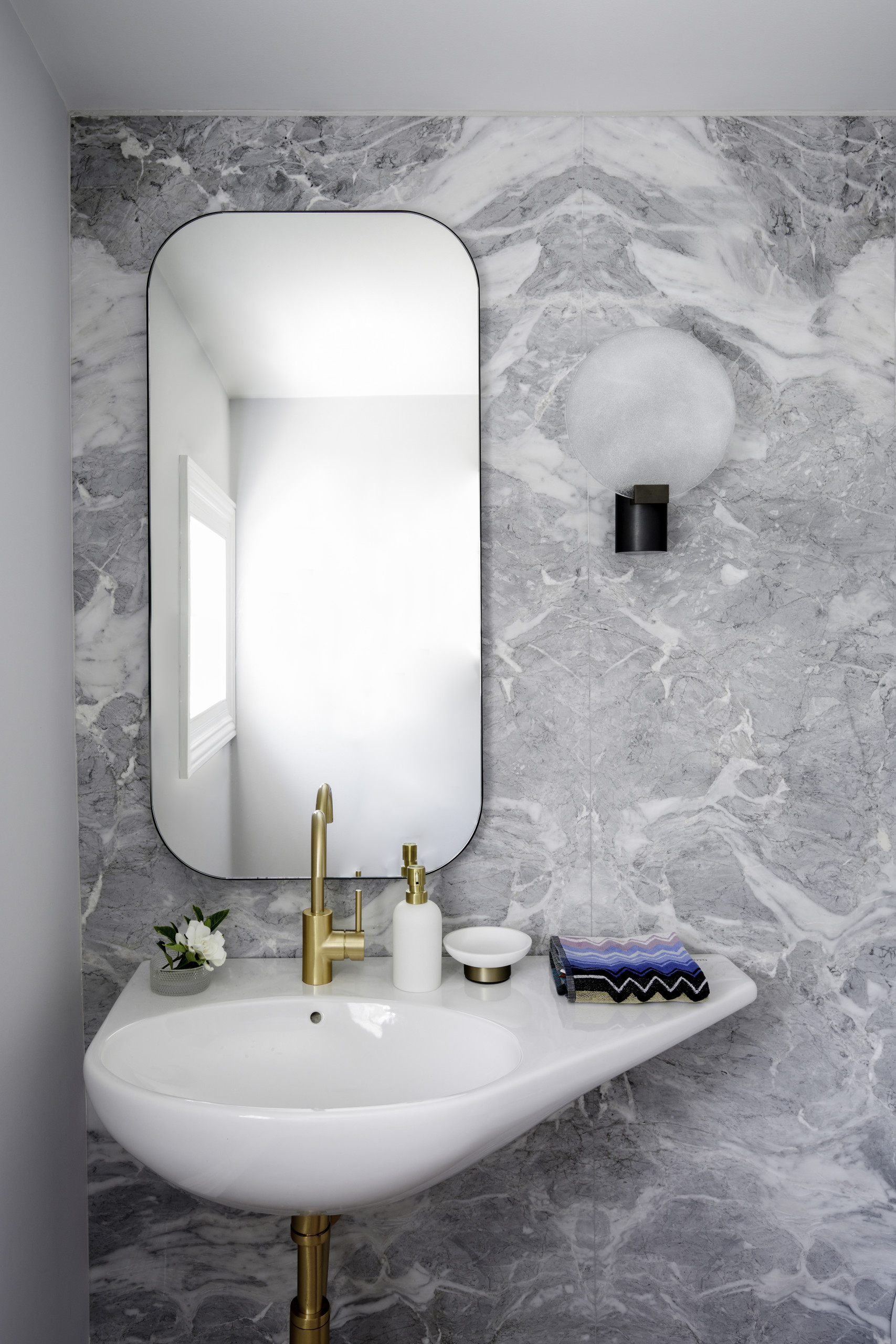 SNB Stone Galaxy Silver marble features in this bathroom by Nathan Gornall Design