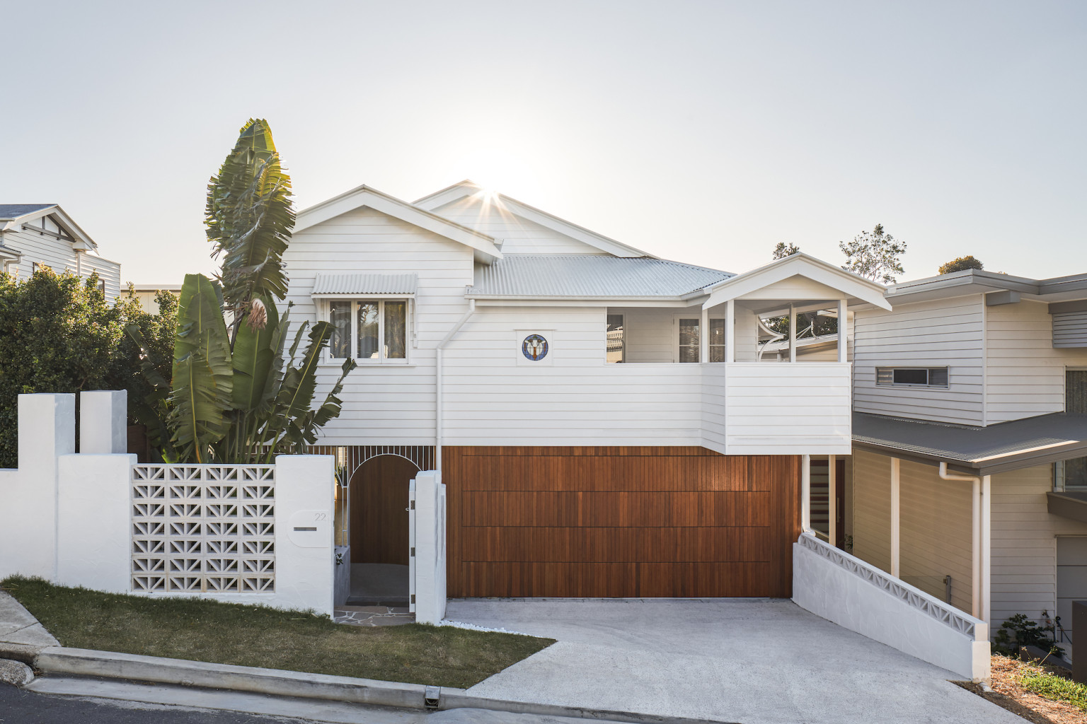 Revamped Queenslander with city views gets whole new interior The