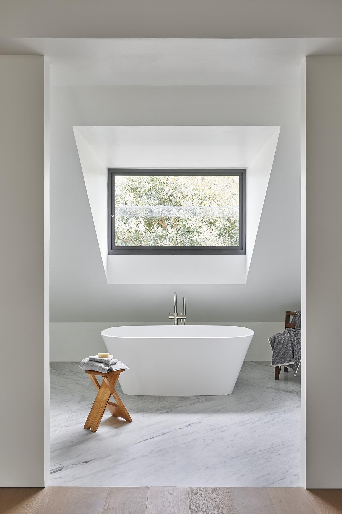 Quaint exterior belies light-filled family home behind - The Interiors ...