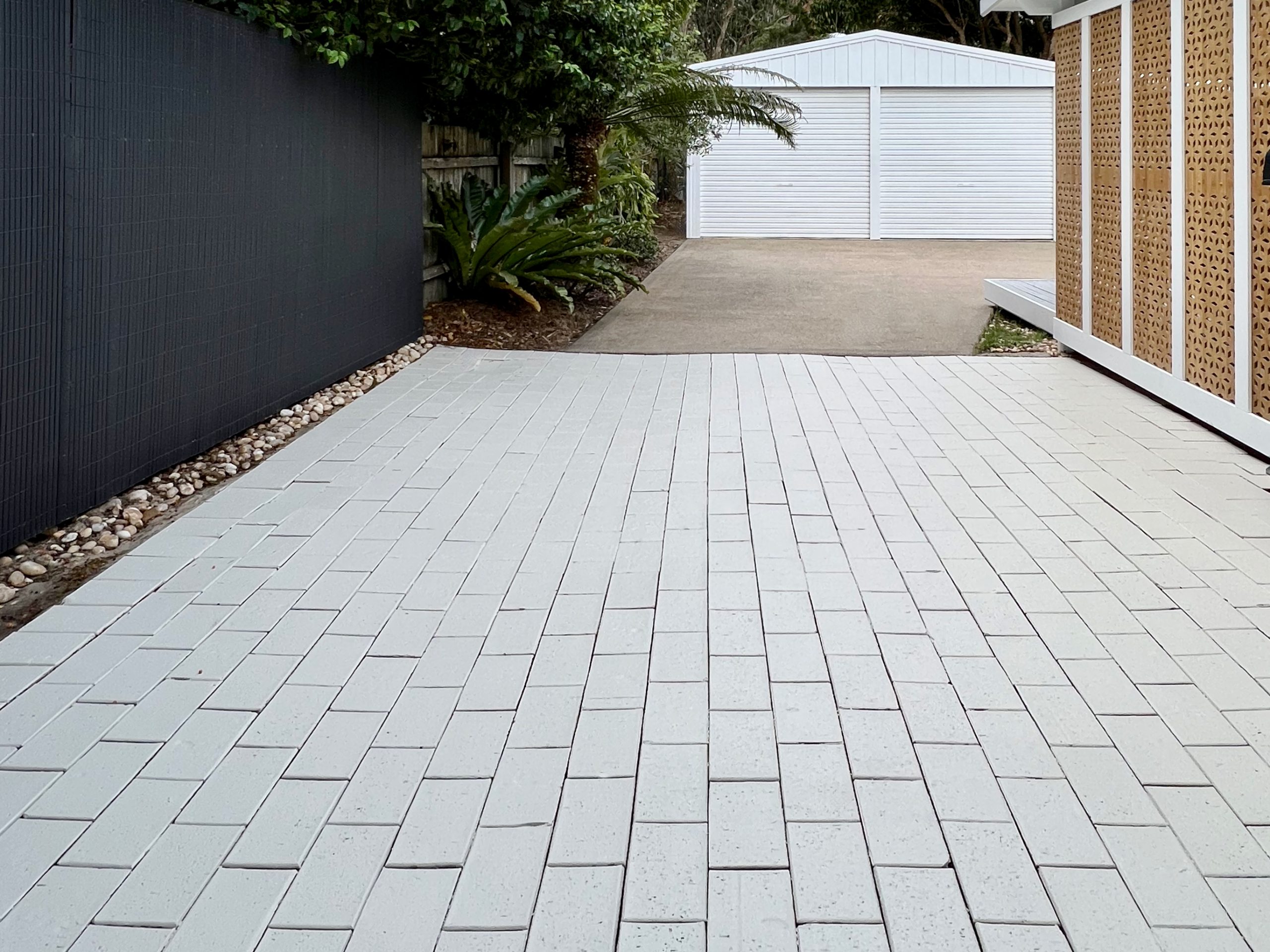 Save thousands by painting your pavers instead of replacing them