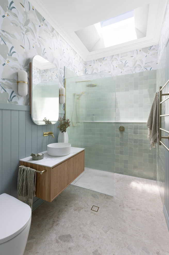 A stunning sage green bathroom transformation with wallpaper The