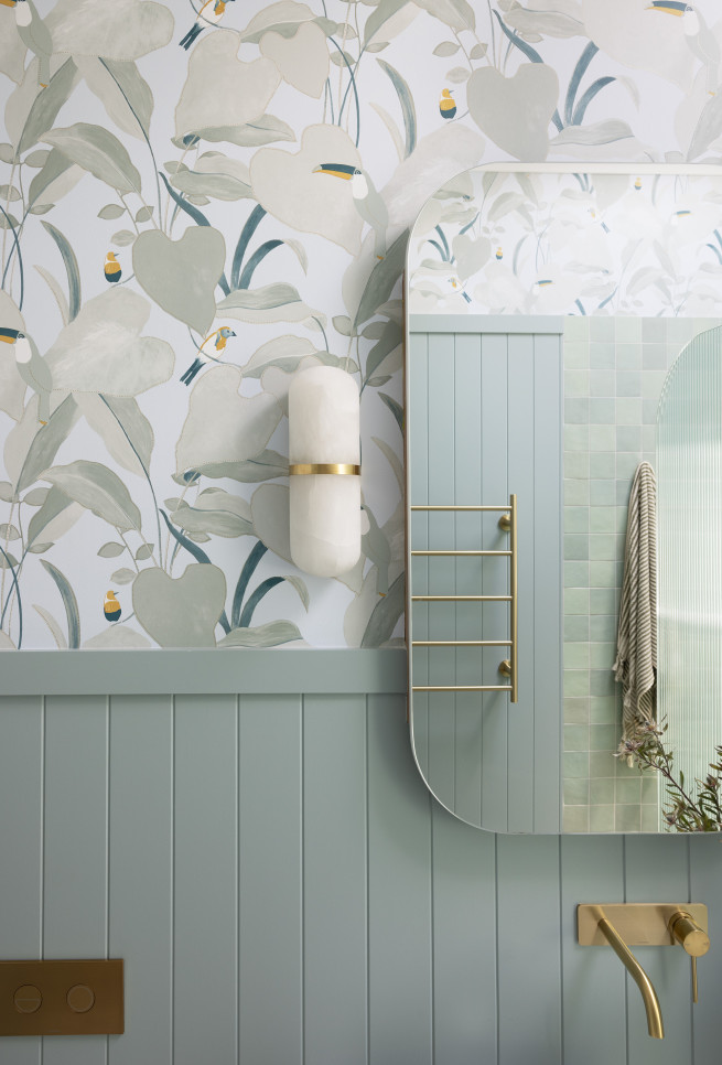 A stunning sage green bathroom transformation with wallpaper The